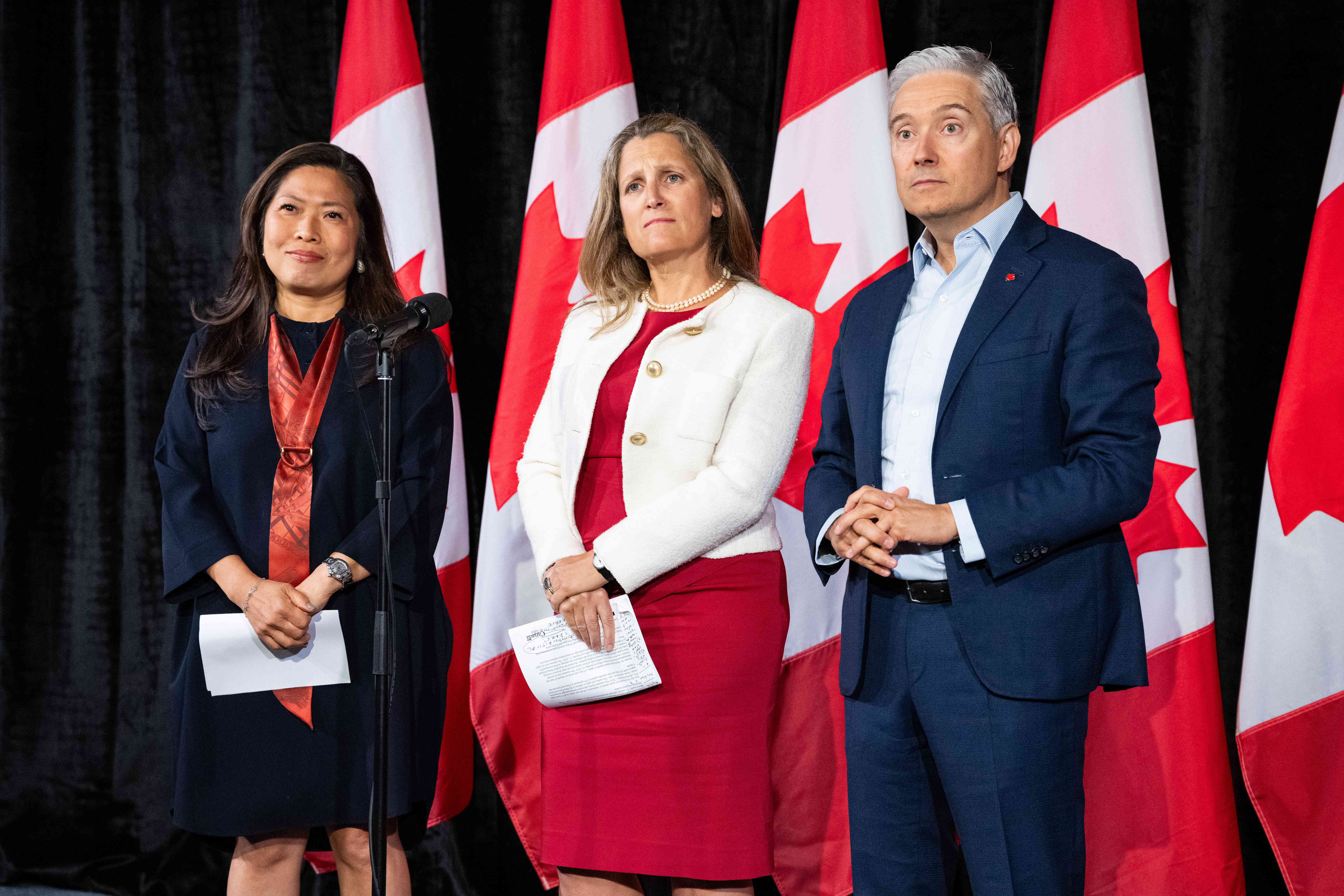 Mary Ng, Canada's export promotion, international trade and economic development minister, from left, Chrystia Freeland, Canada's deputy prime minister and finance minister, and Francois-Philippe Champagne, Canada's innovation, science and industry minister, during a news conference at a cabinet retreat in Halifax, Nova Scotia, Canada, on Monday, Aug. 26, 2024