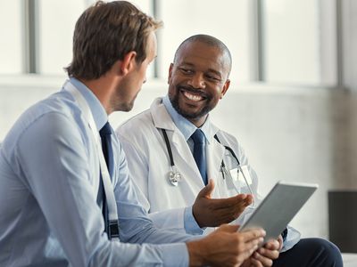 Two male doctors talking together