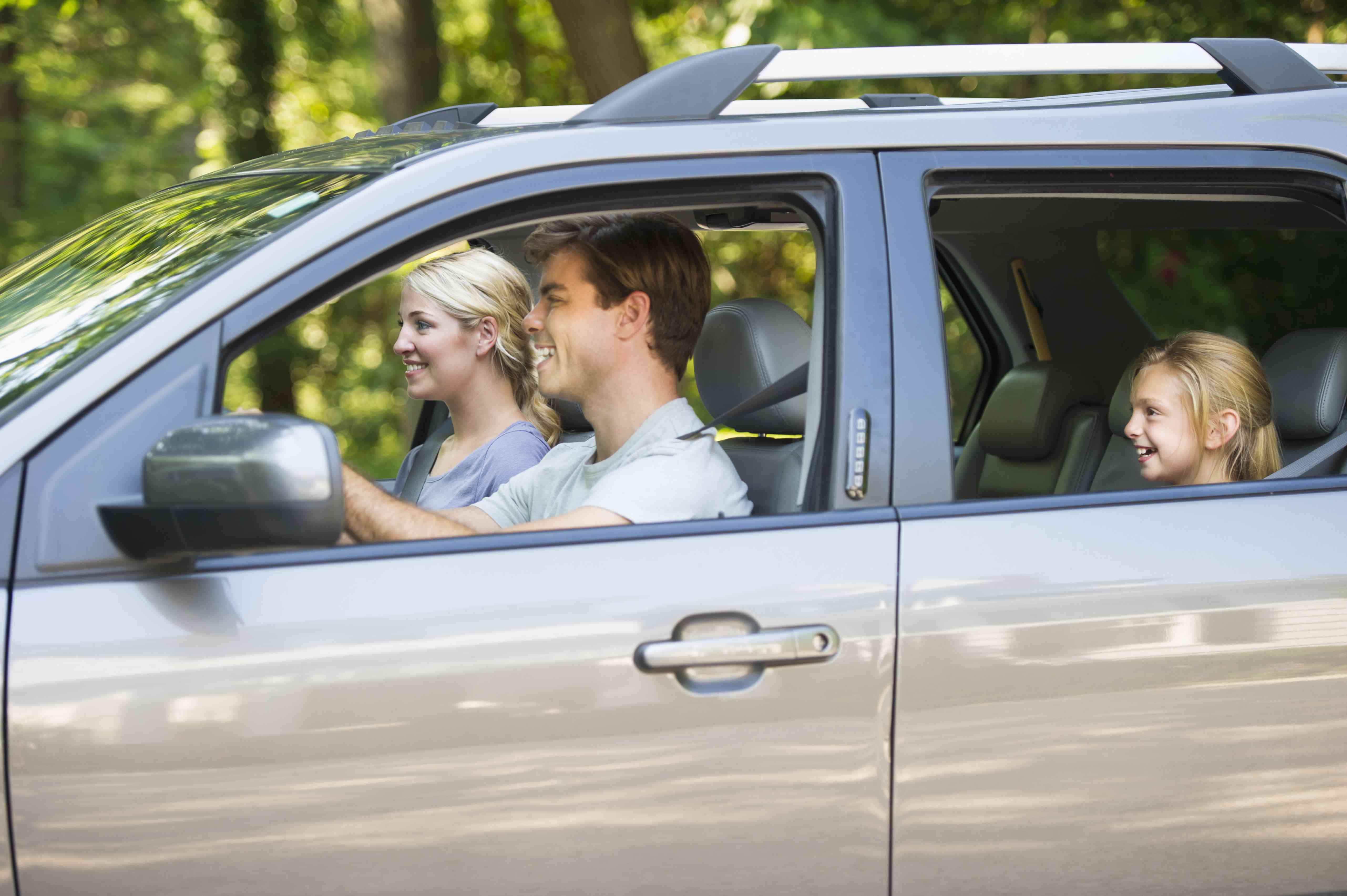 A family rides in a car.