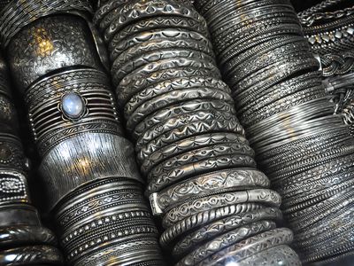 rows of silver bangles