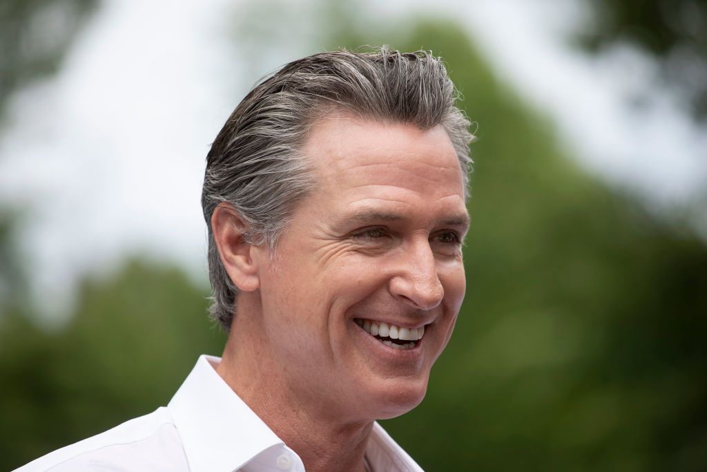 California Gov. Gavin Newsom campaigns for President Joe Biden at the Van Buren County Democratic Party's "BBQ for Biden-Harris" event on July 4, 2024 in South Haven, Michigan.