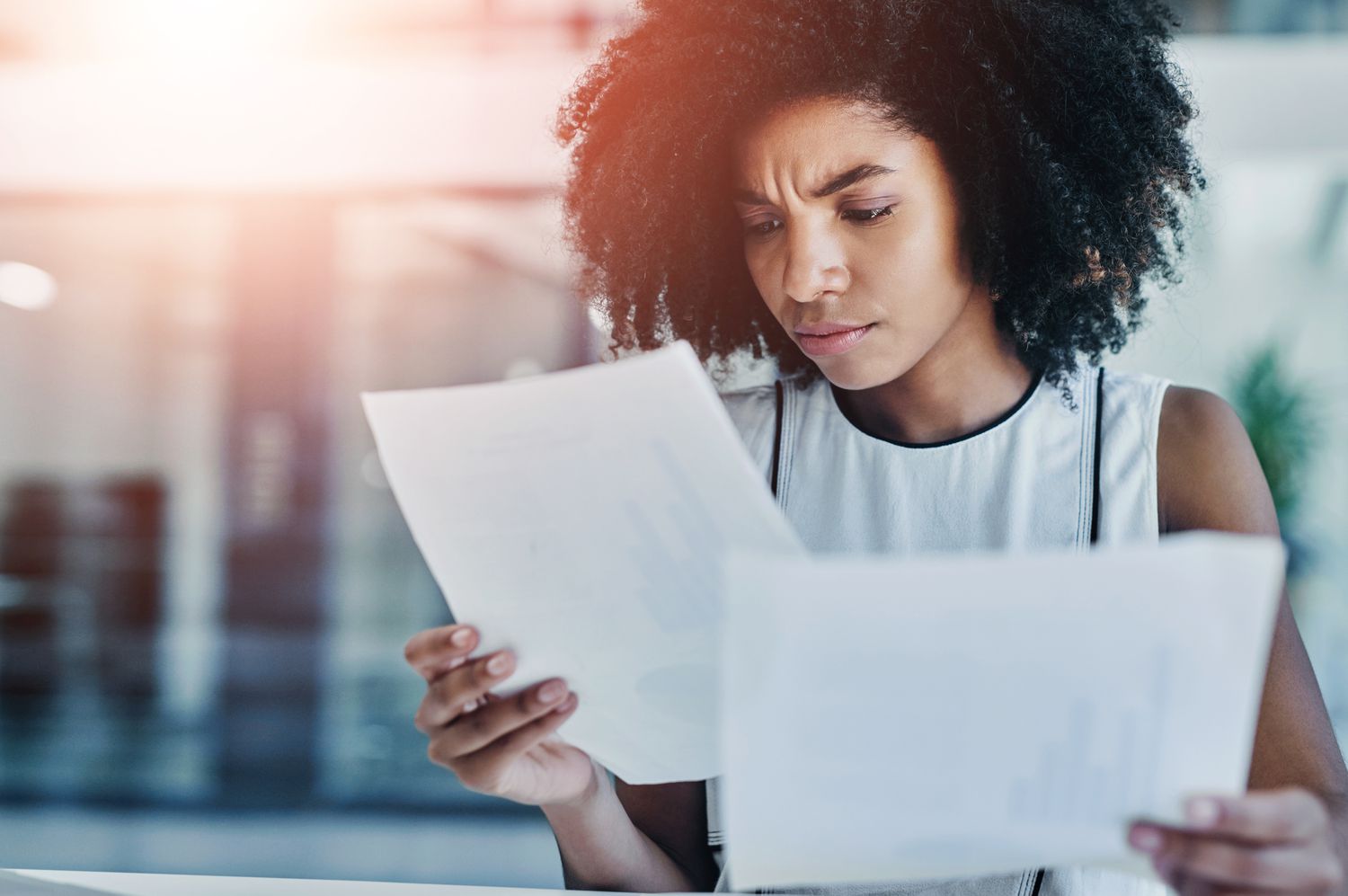 Business woman looking at paperwork