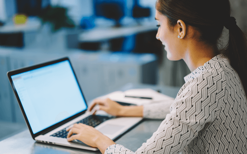 Women typing on laptop keyboards