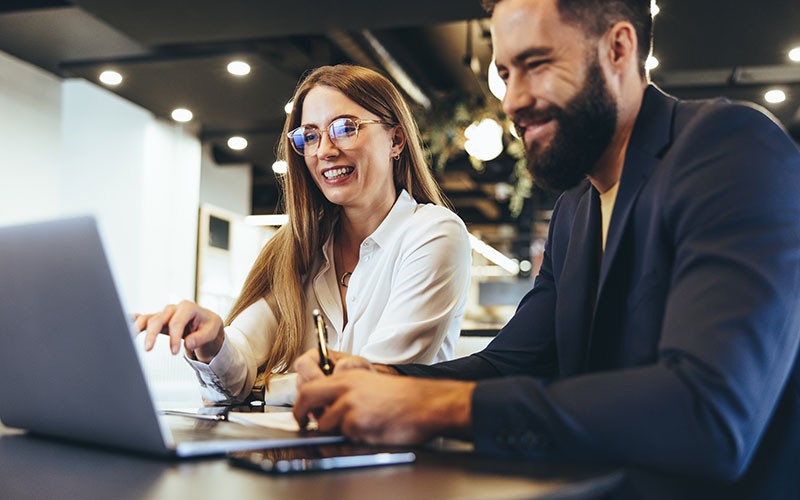 Users working together smiling