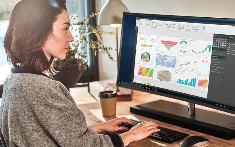 Female working on Power BI platform