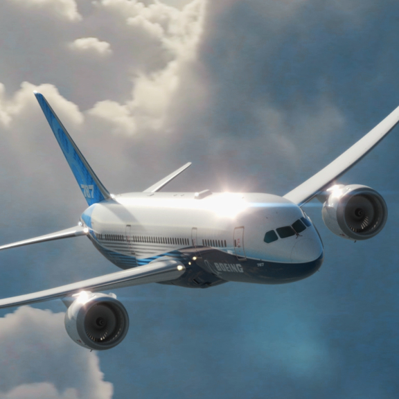 A Boeing Jetliner flying in the clouds.