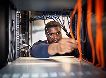 Student working on a server