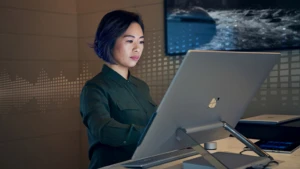 Woman working on a Surface device.