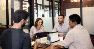 Small conference meeting in modern workspace.