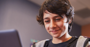 A student working on a PC.