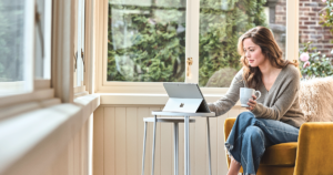 woman at desk with laptop