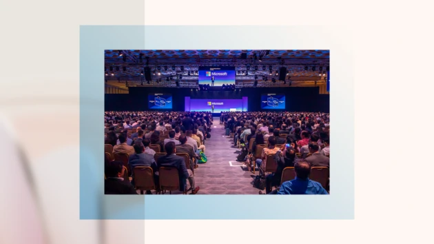 A large crowd of people attending the Microsoft AI Tour in Mumbai, India