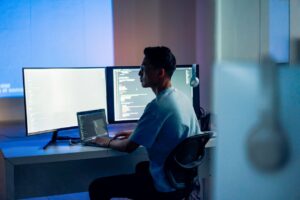 a man sitting at a computer