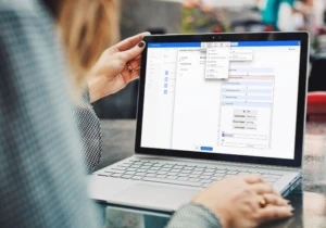 Person at laptop using Microsoft Power Automate.