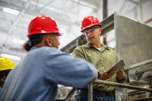 Operations manager meets with a shop foreman.