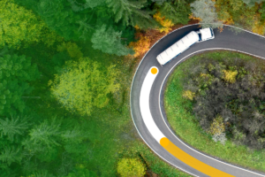 A picture of a truck on a winding road