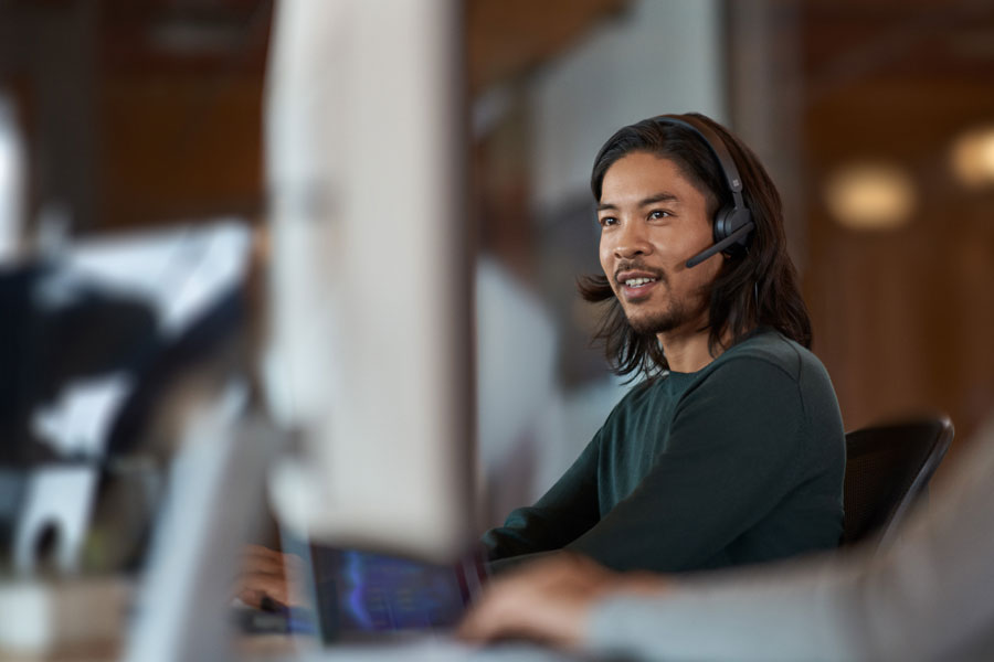 Man wearing a headset talking