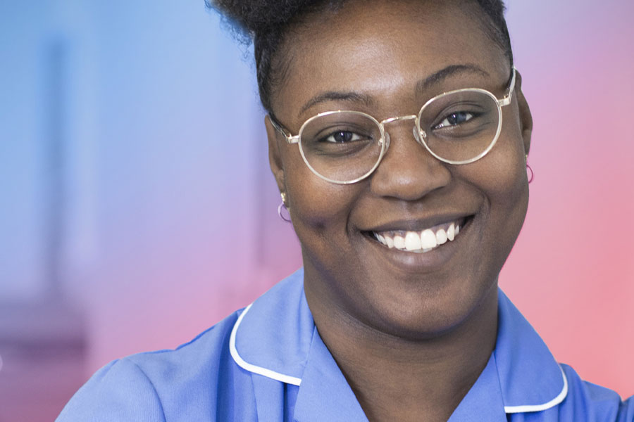 Two nurses in a hospital having a discussion