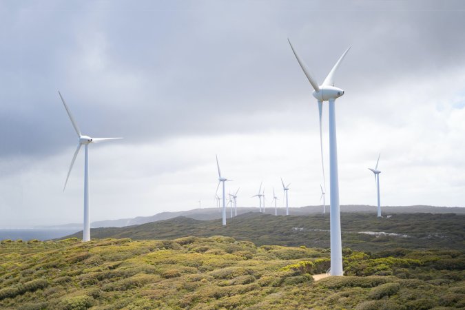 Wind turbines on hill.