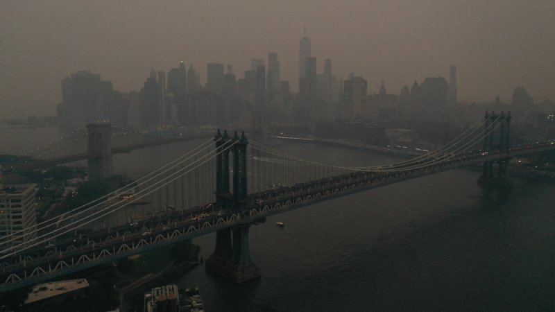 The Downtown Manhattan skyline stands shrouded in a reddish haze as a result of Canadian wildfires on June 6, 2023 in New York City. Over 100 wildfires are burning in the Canadian province of Nova Scotia and Quebec resulting in air quality health alerts for the Adirondacks, Eastern Lake Ontario, Central New York, and Western New York.