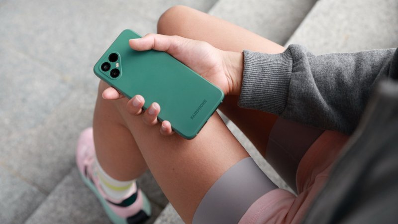 person holding latest fairphone