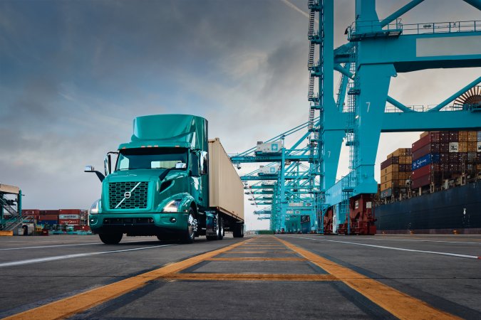 blue truck on loading docks