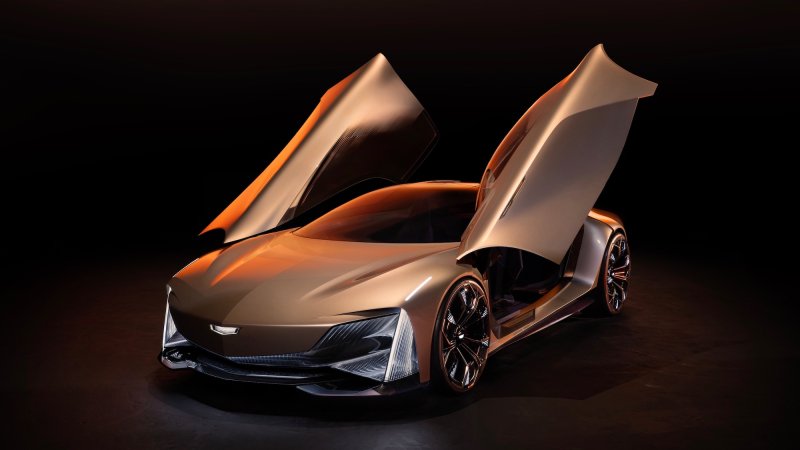 Front 3/4 view of Cadillac Opulent Velocity concept vehicle with open butterfly doors.