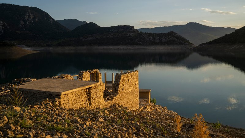 remnants of a sunken village in a very dry reservoir