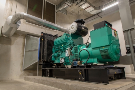 Large engine in a generator room. 