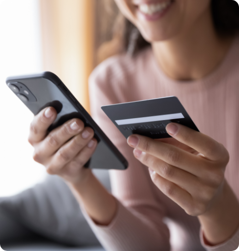 Rheumatology patient making credit card on mobile phone