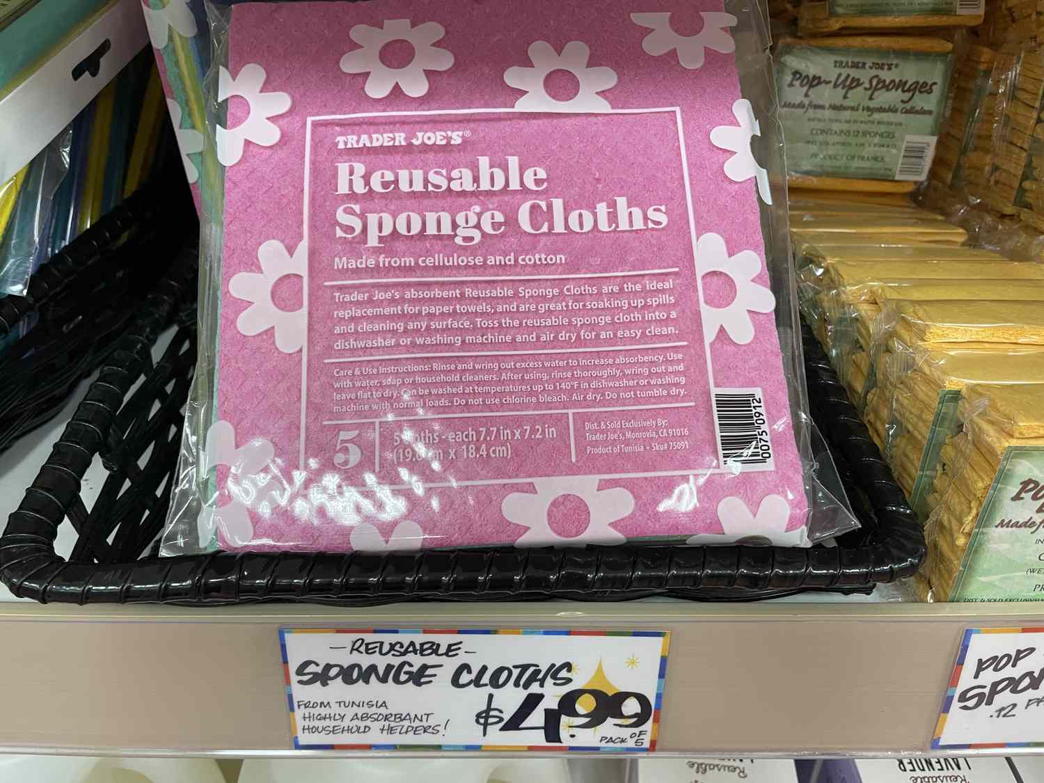 Trader Joe's reusable sponge cloths on a shelf with a $4.99 price tag