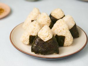 Karashi Mentaiko Onigiri (Spicy Cod Roe Rice Ball) on a plate 