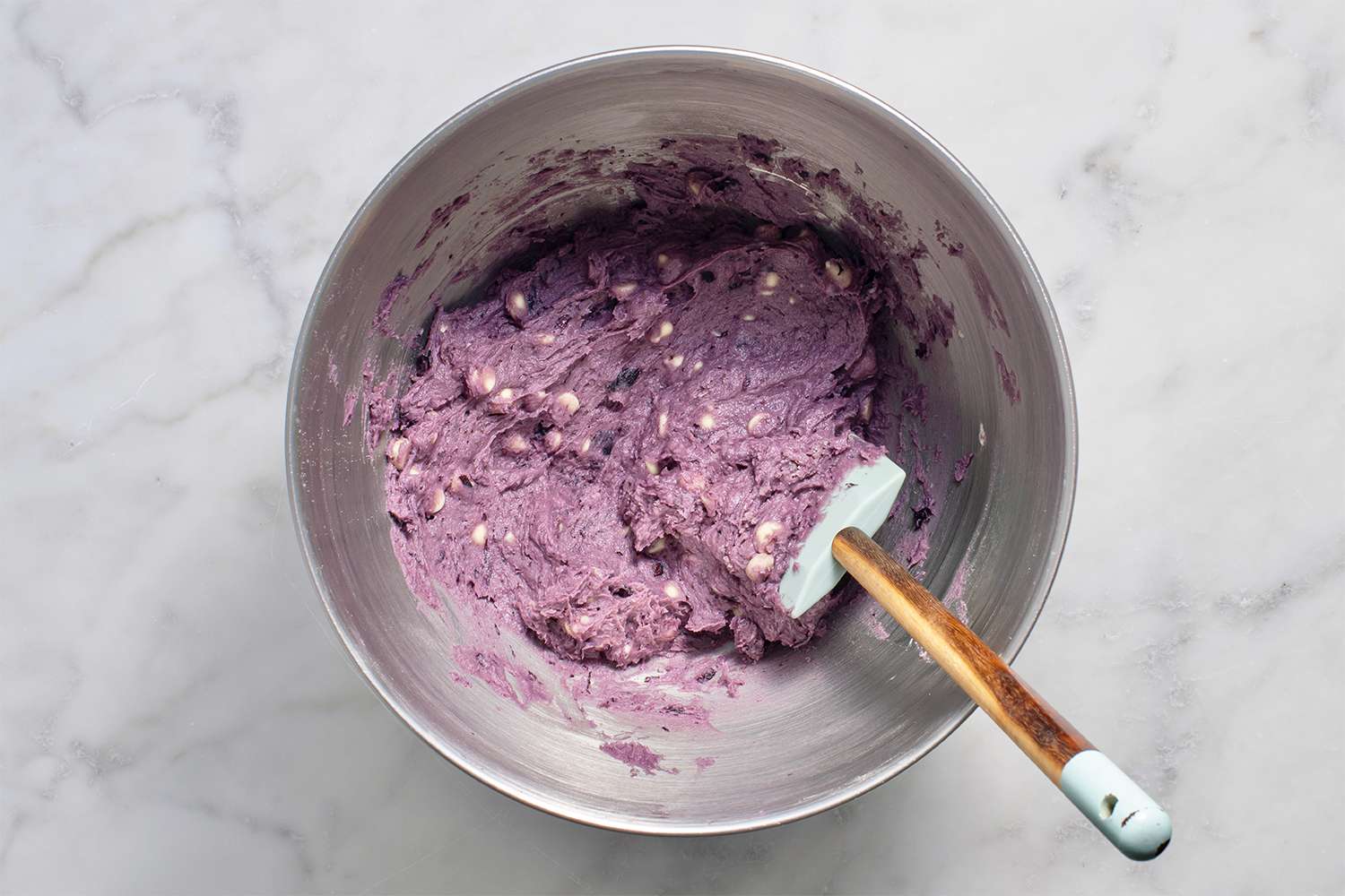 Cookie batter in a bowl with a spatula 