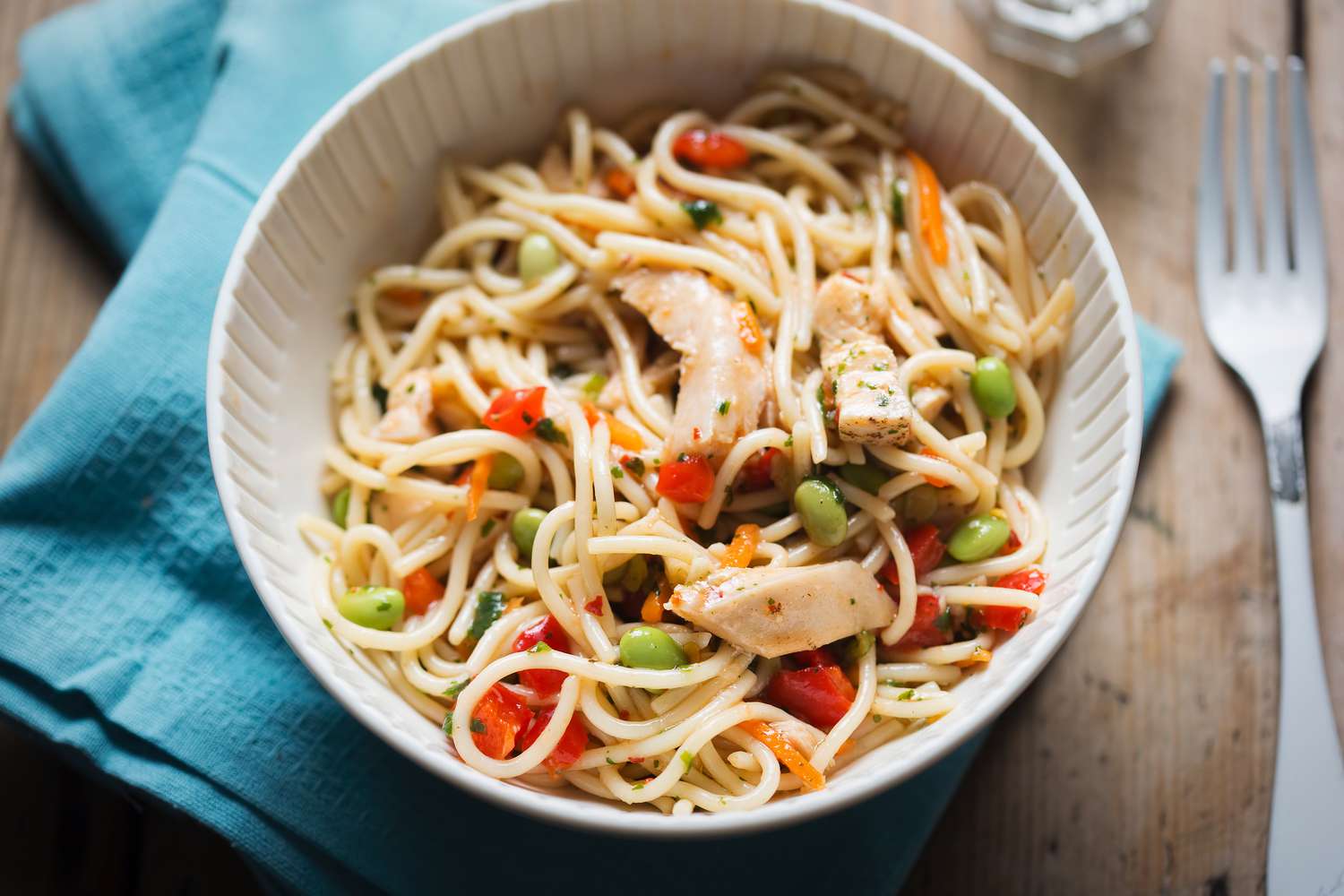 Sweet chilli chicken pasta salad with edamame and red peppers