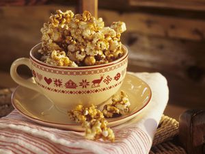 Popcorn with caramel in teacup