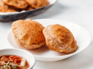 Poori (Fried Indian Flatbread) on a plate 