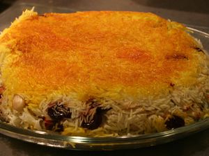 A tahdig rice dish with added cherries