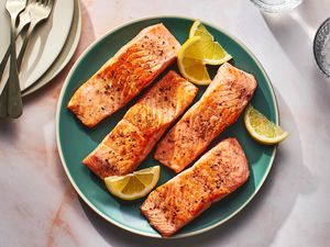 Pan-seared salmon served with lemon