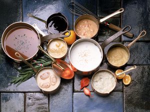 Assortment of sauce in copper pots