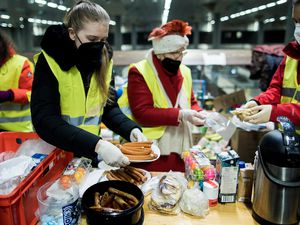 People helping provide food for people in Ukraine 