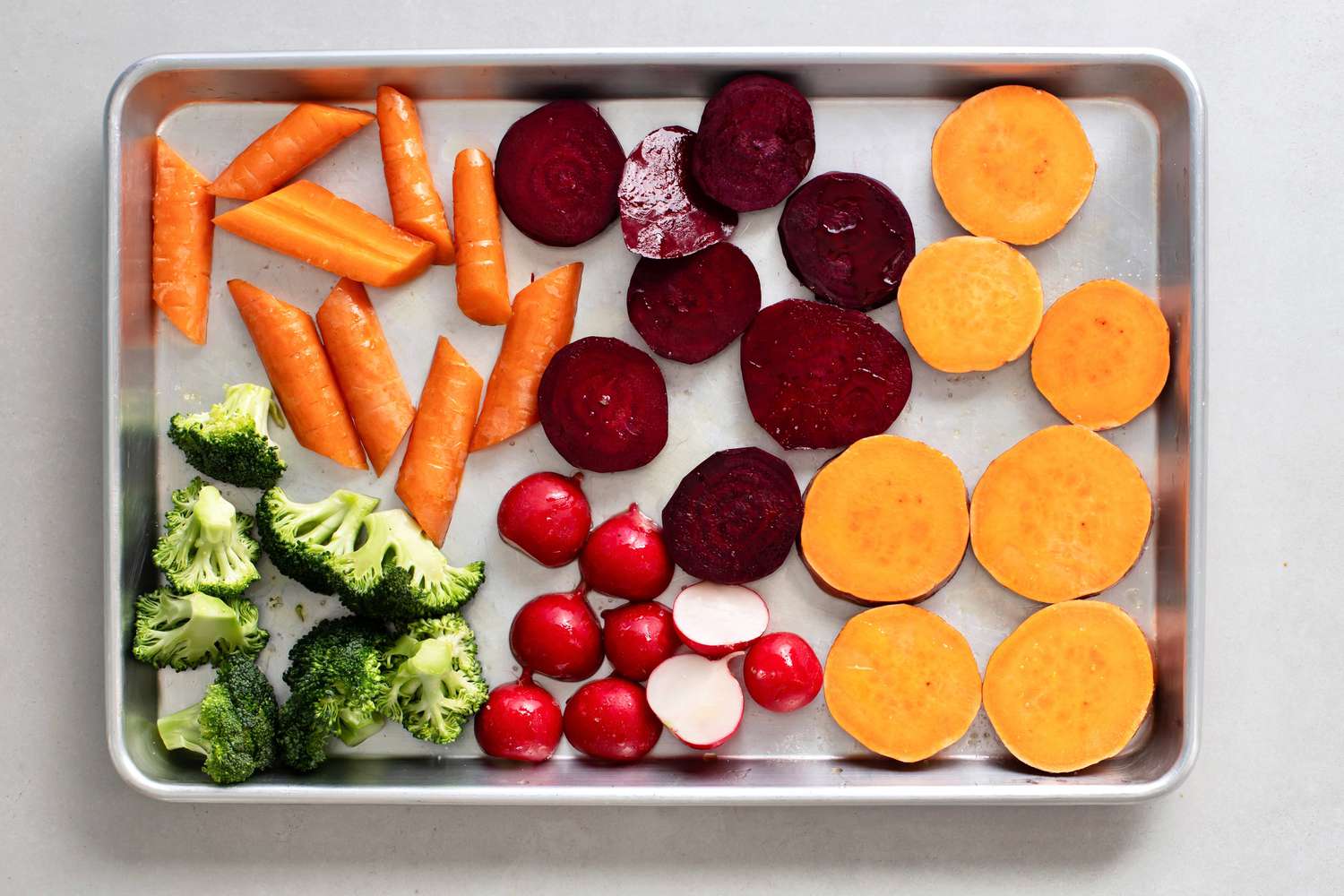 vegetables on a sheet rack with oil