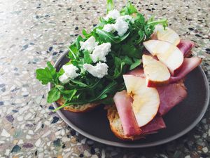 Goat cheese, apple, rosemary ham &amp; honey sandwich with fresh arugula