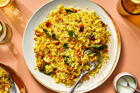 Lemon Rice on a plate with a spoon 