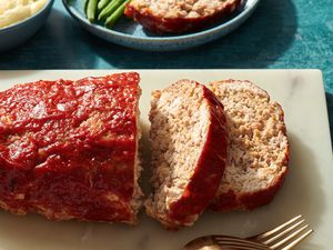 Sliced easy turkey meatloaf on a cutting board