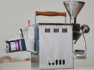 Kaldi Motorized Home Coffee Roaster displayed on a kitchen table