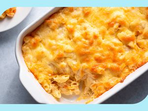 An overhead photo of a baking dish filled with super creamy mac and cheese