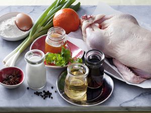 Ingredients to make crispy duck pancakes, including mirin