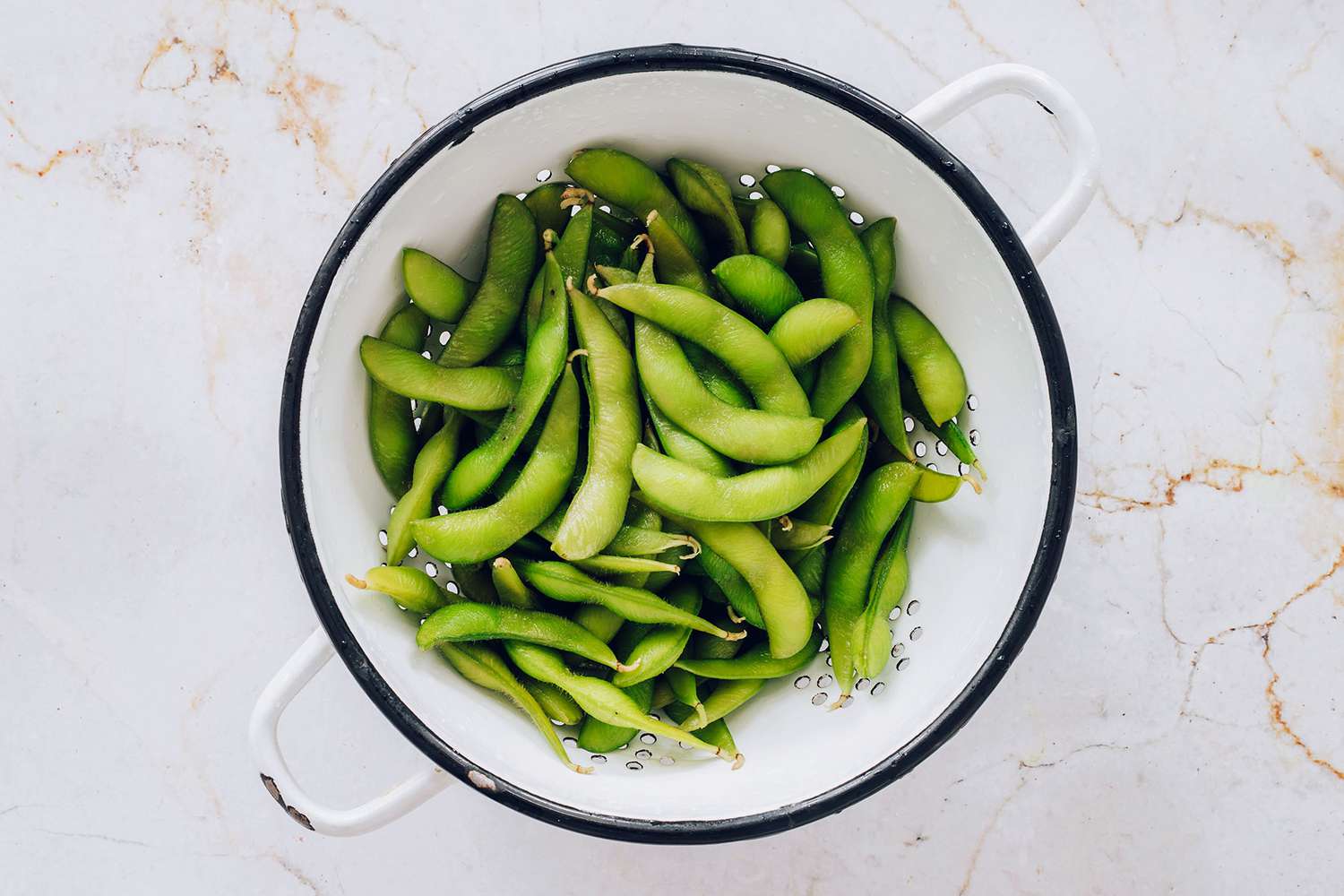 edamame in a colander 