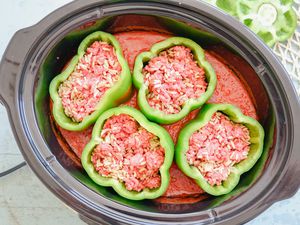 Stuffed peppers and tomato sauce.