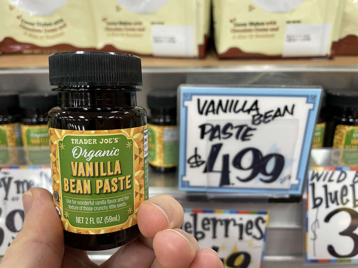 Trader Joe's organic vanilla bean paste with a $4.99 price tag in the background